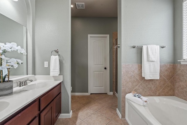 3517 Shellcastle Ln, Round Rock, TX 78681 - full bathroom with a garden tub, tile patterned flooring, double vanity, and a shower stall