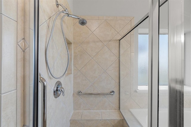 5501 Wild Foxglove Rd, Spicewood, TX 78669 - bathroom with a shower stall