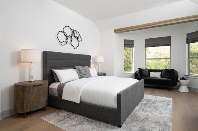 225 Hazy Hills Loop, Dripping Springs, TX 78620 - bedroom featuring light wood finished floors and lofted ceiling