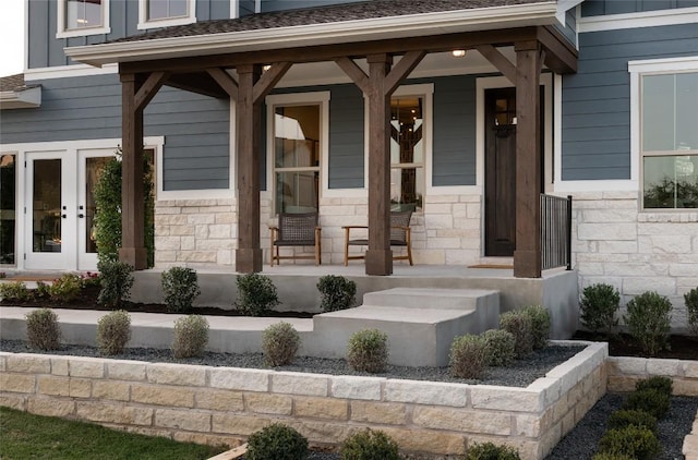 225 Hazy Hills Loop, Dripping Springs, TX 78620 - property entrance featuring stone siding and a porch