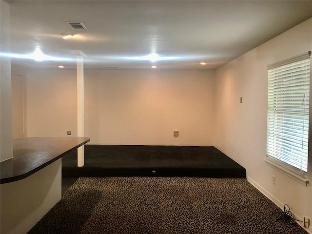2403 Sherwood Ln, Austin, TX 78704 - below grade area featuring carpet floors and baseboards