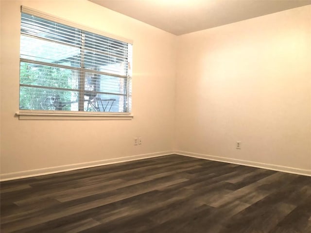 2403 Sherwood Ln, Austin, TX 78704 - empty room with baseboards and dark wood finished floors
