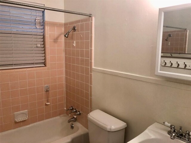 2403 Sherwood Ln, Austin, TX 78704 - full bathroom with washtub / shower combination and toilet