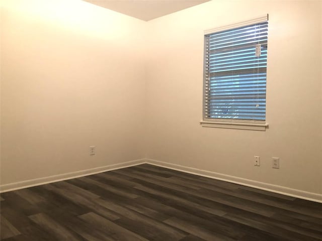 2403 Sherwood Ln, Austin, TX 78704 - empty room with baseboards and dark wood-style floors
