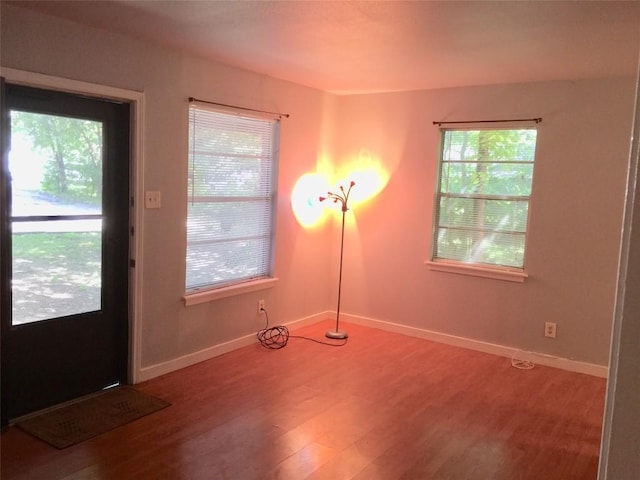 2403 Sherwood Ln, Austin, TX 78704 - entrance foyer with healthy amount of natural light, light wood finished floors, and baseboards