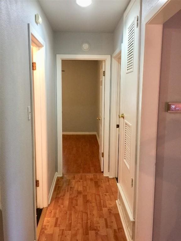 2403 Sherwood Ln, Austin, TX 78704 - hall featuring light wood-style flooring and baseboards