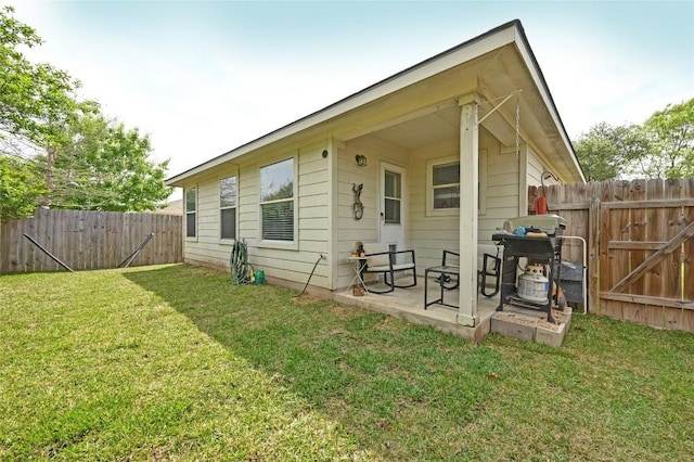 8505 Shallot Way, Austin, TX 78748 - rear view of house with a gate and a patio area