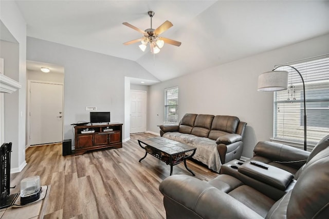 8505 Shallot Way, Austin, TX 78748 - living area with ceiling fan, light wood-style floors, lofted ceiling, and baseboards