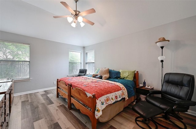 8505 Shallot Way, Austin, TX 78748 - bedroom with wood finished floors, baseboards, and ceiling fan