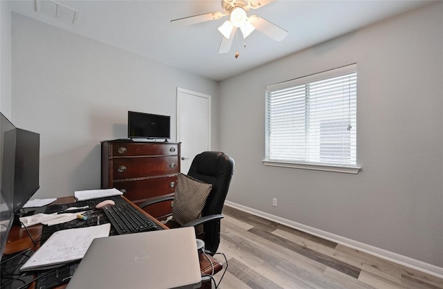 8505 Shallot Way, Austin, TX 78748 - office space with wood finished floors, baseboards, and ceiling fan