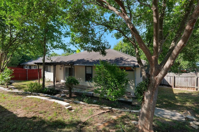 5808 Spring Meadow Rd, Austin, TX 78744 - back of house with roof with shingles