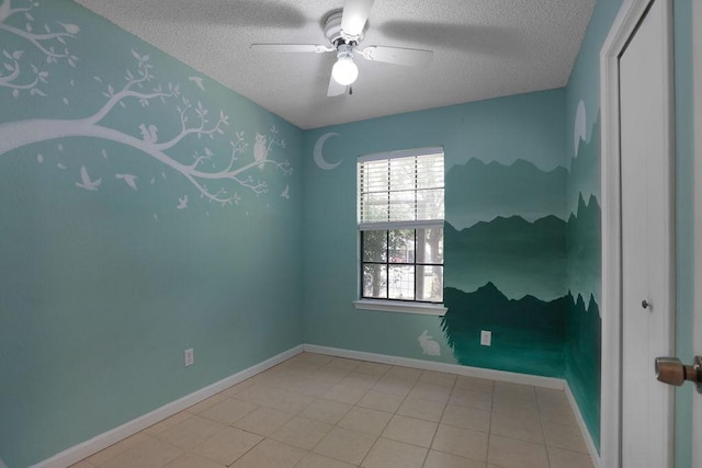 5808 Spring Meadow Rd, Austin, TX 78744 - spare room with a textured ceiling, a ceiling fan, baseboards, and wallpapered walls