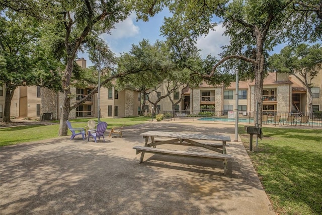 8600 Fathom Cir Unit 1303, Austin, TX 78750 - surrounding community featuring a swimming pool
