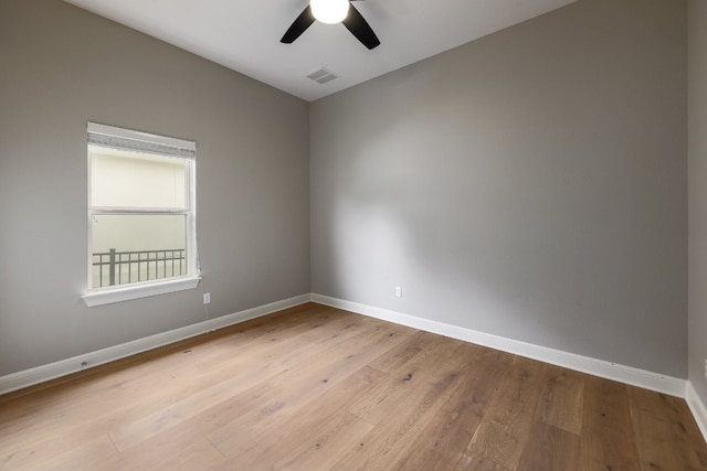 3324 Venezia Vw, Leander, TX 78641 - spare room featuring ceiling fan, baseboards, and light wood finished floors