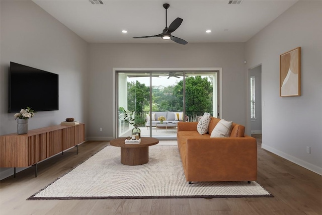 3324 Venezia Vw, Leander, TX 78641 - living room featuring wood finished floors, baseboards, ceiling fan, and recessed lighting