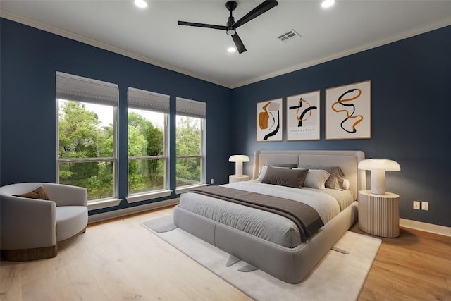 3324 Venezia Vw, Leander, TX 78641 - bedroom with crown molding, wood finished floors, baseboards, ceiling fan, and recessed lighting