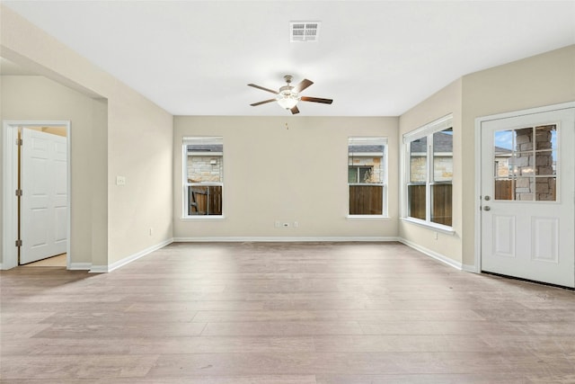 4203 Birdwatch Loop Unit 14, Pflugerville, TX 78660 - unfurnished room featuring ceiling fan and light wood-style floors