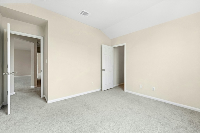 4203 Birdwatch Loop Unit 14, Pflugerville, TX 78660 - unfurnished room with carpet and vaulted ceiling
