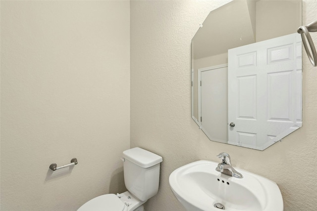 4203 Birdwatch Loop Unit 14, Pflugerville, TX 78660 - bathroom featuring a sink and toilet