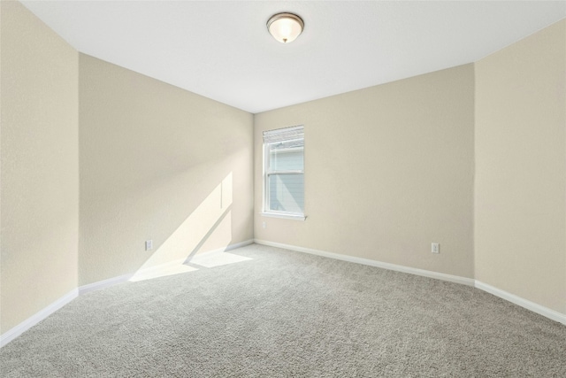 4203 Birdwatch Loop Unit 14, Pflugerville, TX 78660 - carpeted spare room featuring baseboards