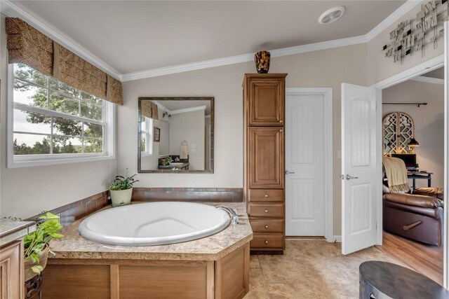 7500 Muleshoe Bend Trl, Marble Falls, TX 78654 - full bath featuring a garden tub and ornamental molding