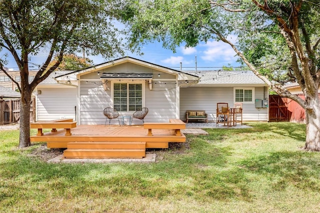 1505 Wheless Ln, Austin, TX 78723 - rear view of property featuring a deck and a shingled roof