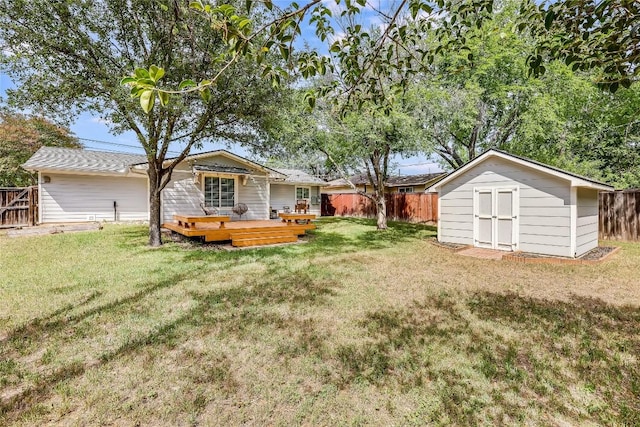 1505 Wheless Ln, Austin, TX 78723 - back of house featuring a shed, a deck, and a fenced backyard