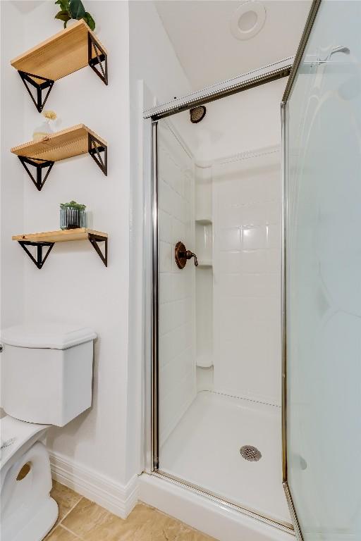 1505 Wheless Ln, Austin, TX 78723 - bathroom featuring toilet and a stall shower