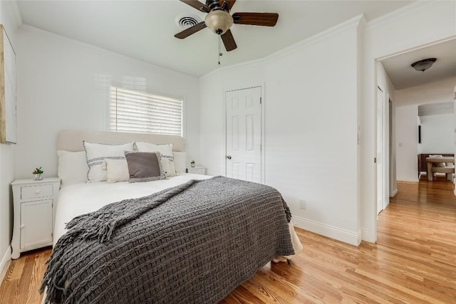1505 Wheless Ln, Austin, TX 78723 - bedroom with light wood-type flooring and a ceiling fan