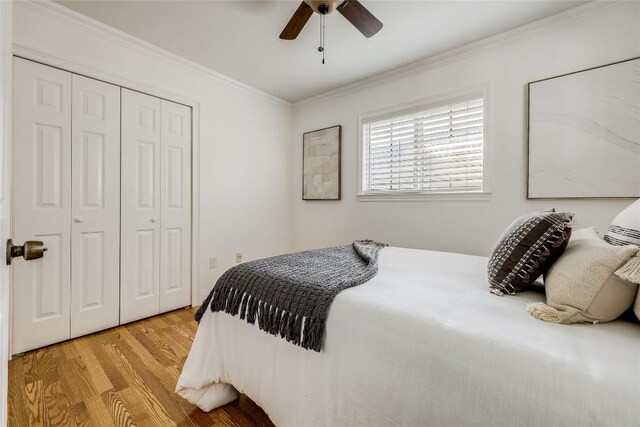 1505 Wheless Ln, Austin, TX 78723 - bedroom featuring light wood-type flooring, ornamental molding, a closet, and ceiling fan