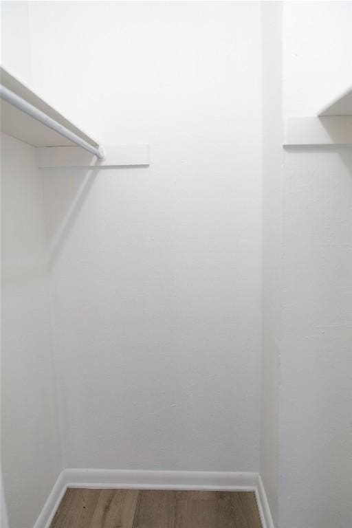 2425 Ashdale Dr Unit 18, Austin, TX 78757 - spacious closet featuring wood finished floors