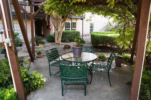 2425 Ashdale Dr Unit 18, Austin, TX 78757 - view of patio with outdoor dining area