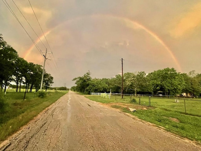 309 Stolle Ln, Flatonia, TX 78941 - view of asphalt road with a rural view