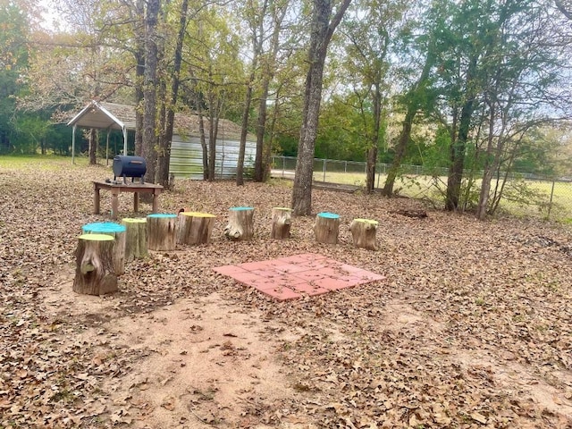 309 Stolle Ln, Flatonia, TX 78941 - view of yard with a carport