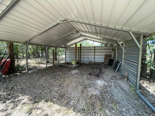 309 Stolle Ln, Flatonia, TX 78941 - view of parking / parking lot featuring a detached carport