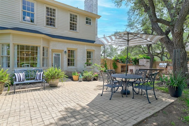 303 Rio Bravo Rd, Georgetown, TX 78628 - view of patio with outdoor dining space and area for grilling