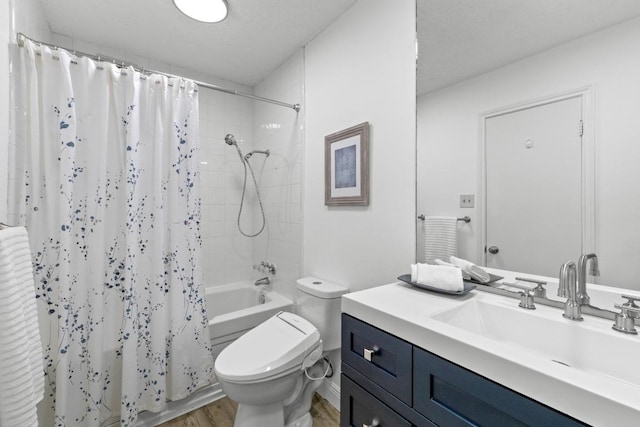 6109 Bullard Dr Unit A, Austin, TX 78757 - bathroom with vanity, wood finished floors, and shower / bath combo with shower curtain