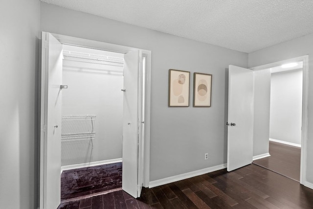 6109 Bullard Dr Unit A, Austin, TX 78757 - unfurnished bedroom with wood finished floors and a textured ceiling