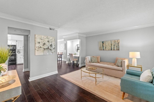 6109 Bullard Dr Unit A, Austin, TX 78757 - living room with crown molding, a textured ceiling, and dark wood-style flooring