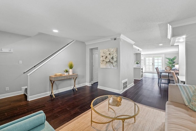 6109 Bullard Dr Unit A, Austin, TX 78757 - living room with wood finished floors, stairway, ornamental molding, and recessed lighting