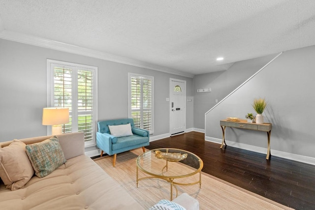 6109 Bullard Dr Unit A, Austin, TX 78757 - living area featuring a textured ceiling, wood finished floors, ornamental molding, stairway, and recessed lighting