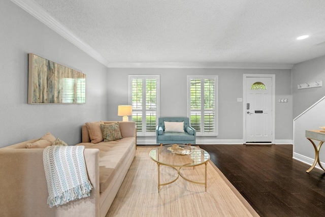 6109 Bullard Dr Unit A, Austin, TX 78757 - living room with wood finished floors, a textured ceiling, ornamental molding, stairs, and recessed lighting