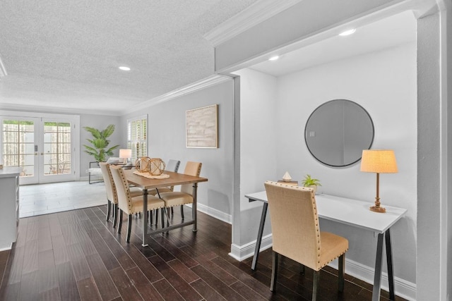 6109 Bullard Dr Unit A, Austin, TX 78757 - dining space featuring dark wood-type flooring, a textured ceiling, recessed lighting, crown molding, and french doors