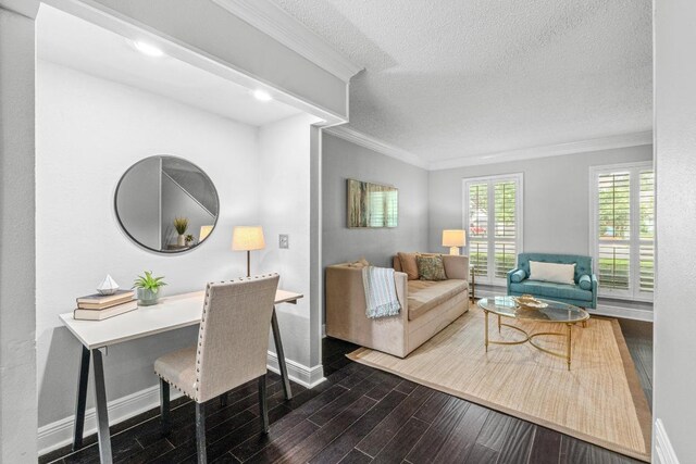 6109 Bullard Dr Unit A, Austin, TX 78757 - living room with dark wood-style floors, ornamental molding, and a textured ceiling