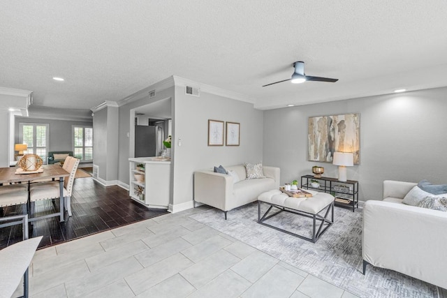 6109 Bullard Dr Unit A, Austin, TX 78757 - living area featuring ornamental molding, a textured ceiling, recessed lighting, and ceiling fan