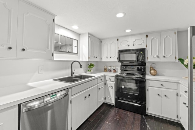 6109 Bullard Dr Unit A, Austin, TX 78757 - kitchen featuring black appliances, white cabinetry, recessed lighting, and dark wood finished floors