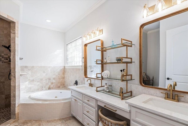 9122 Balcones Club Dr Unit 9, Austin, TX 78750 - bathroom with double vanity, a jetted tub, ornamental molding, a tile shower, and tile patterned floors