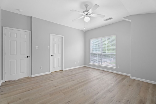 2009 Campfield Pkwy, Austin, TX 78745 - unfurnished bedroom with light wood-style flooring, baseboards, and ceiling fan