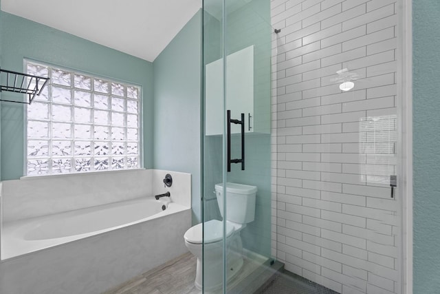 2009 Campfield Pkwy, Austin, TX 78745 - full bathroom with toilet, a bath, wood finished floors, and a shower stall