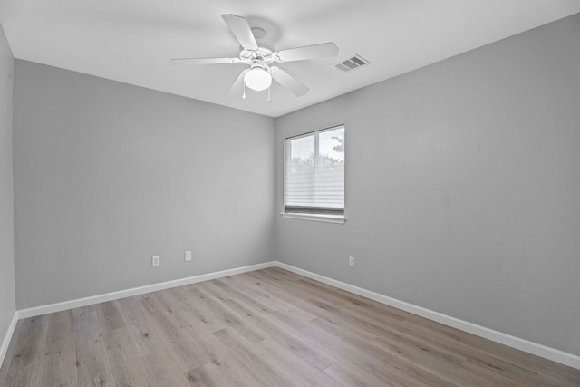 2009 Campfield Pkwy, Austin, TX 78745 - empty room with wood finished floors, baseboards, and ceiling fan